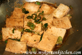 soy sauce boiled tofu simmering tofu