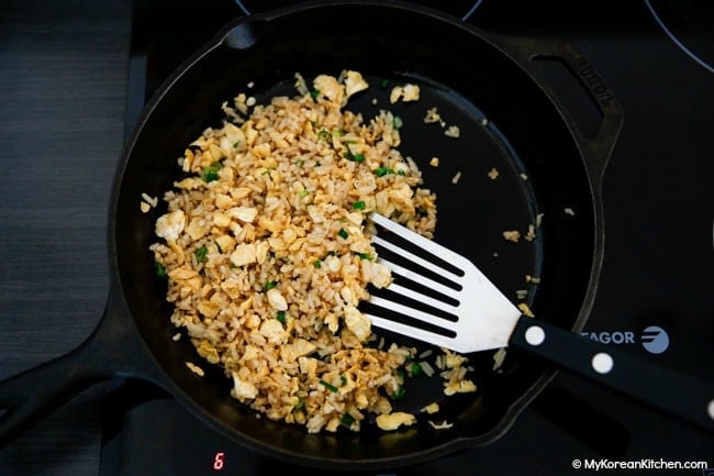 Egg and rice stir fry in a skillet