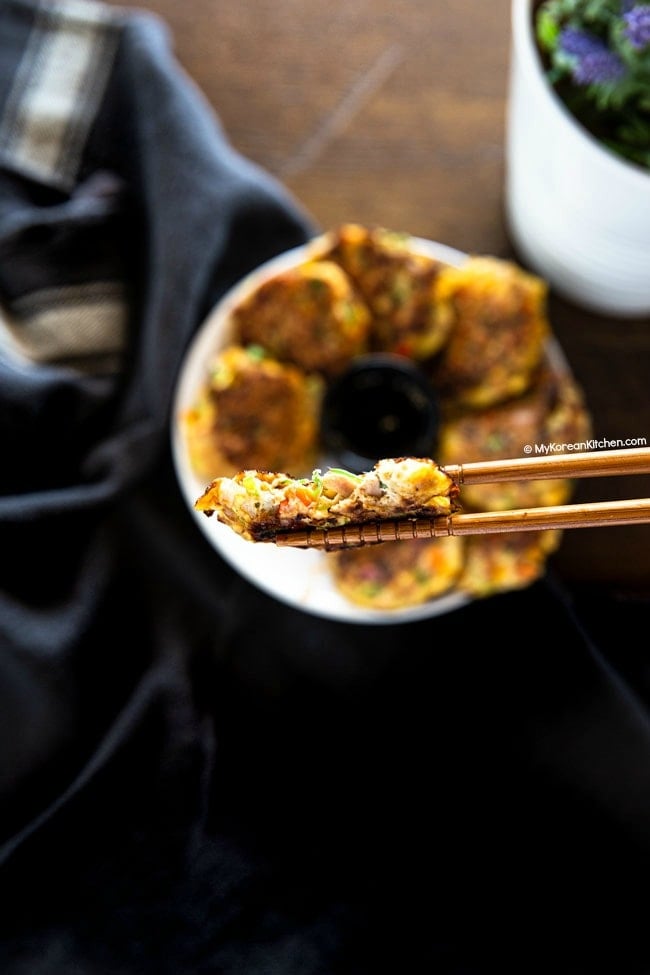 Chopsticks holding a tuna pancake