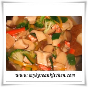 king oyster mushrooms and prawn on rice cooking 2