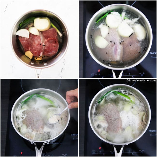 Boiling beef with aromatic ingredients in a large pot.