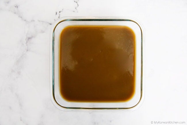 Solidified Acorn Jelly in a clear glass container.