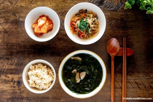 Miyeok guk served with rice and other side dishes