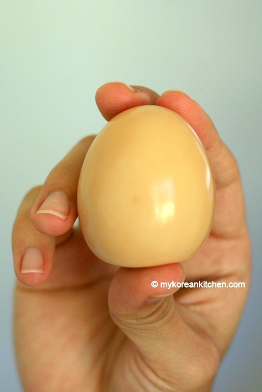 Holding a Korean Sauna Egg after pressure steamed twice for 50 mins | MyKoreanKitchen.com