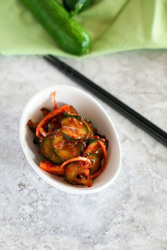 "Korean Spicy Cucumber Salad" - A perfect side dish for spring and summer weather. It gives you a little zing in your tastebuds and it tastes refreshing | MyKoreanKitchen.com