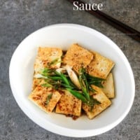 Easy and delicious Korean tofu side dish - Pan Fried Tofu in Garlic Soy Sesame Sauce (Dubu Buchim) recipe. Budget friendly and Vegetarian friendly | MyKoreanKitchen.com