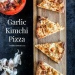Garlic Kimchi Pizza recipe - It's crispy and savoury with a tint of Kimchi flavour. A perfect Korean fusion entry dish that will please your dinning guest. | MyKoreanKitchen.com