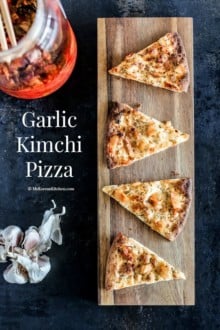 Garlic Kimchi Pizza recipe - It's crispy and savoury with a tint of Kimchi flavour. A perfect Korean fusion entry dish that will please your dinning guest. | MyKoreanKitchen.com