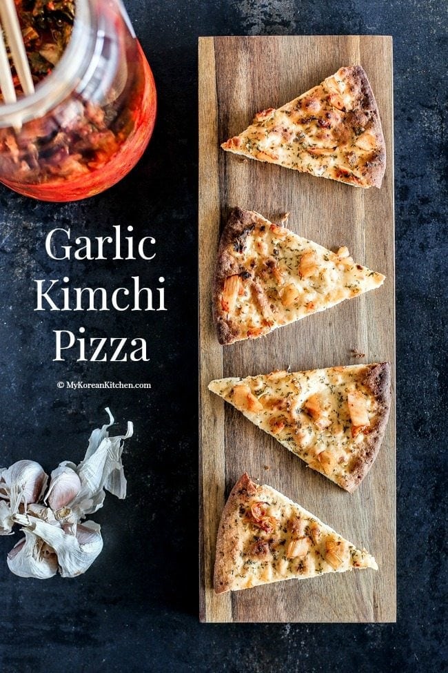 Stone Baked Garlic Kimchi Pizza recipe - It's crispy and savoury with a tint of Kimchi flavour. A perfect Korean fusion entree dish that will please your dinning guest. | Food24h.com