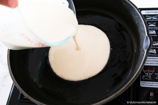 Pouring over pajeon pancake mix