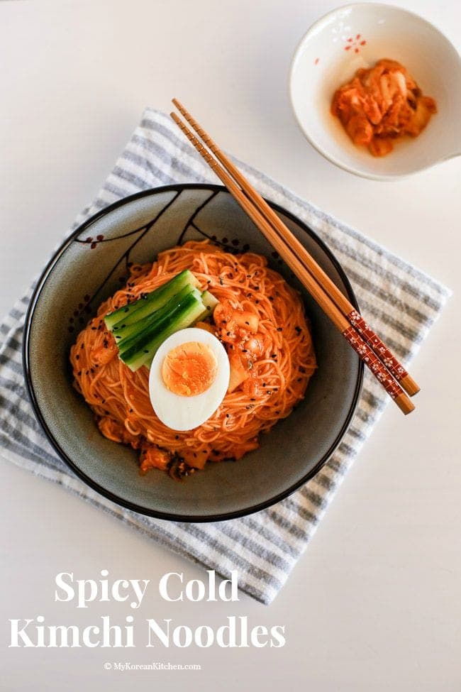 Spicy cold Kimchi noodles recipe - This is a perfect summer time dish. Bring your lost appetite back with these spicy cold Korean noodles! | MyKoreanKitchen.com