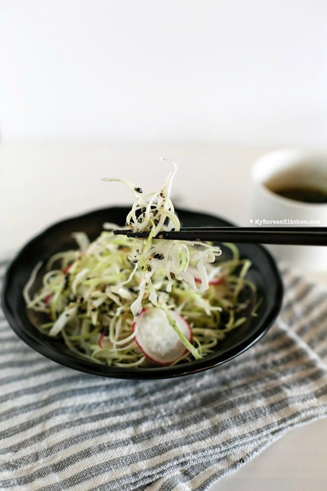 Sweet and Tangy Cabbage Salad - Cabbage and pink radishes served with sweet and tangy roasted sesame seed dressing. It's light, refreshing and crunchy! | MyKoreanKitchen.com