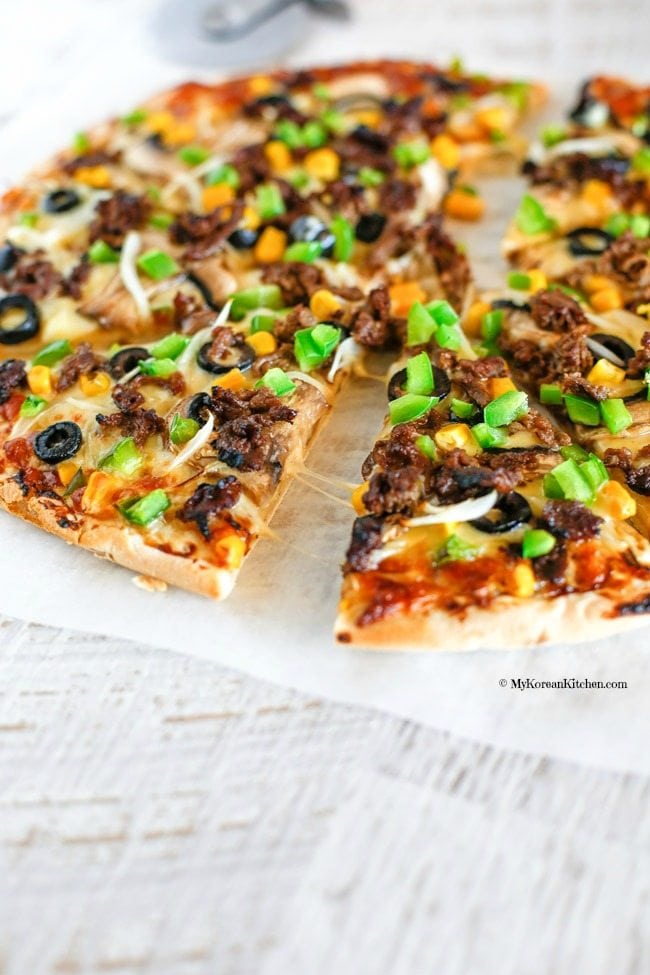 How to make Bulgogi pizza. This is a popular Korean fusion pizza in Korea. It's a great way to use up leftover Bulgogi. It's super delicious! | MyKoreanKitchen.com