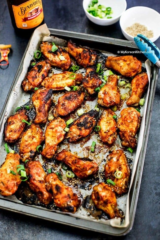 Oven baked Korean style chicken wings. It will make a perfect appetiser for your next gathering! It's marinated with addictive spicy Korean chili sauce! | MyKoreanKitchen.com