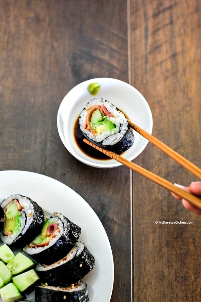 Bacon Avocado Cucumber Sushi Rolls. It has savoury and refreshing flavour and crunchiness. Just perfect for a spring weather! Easy and quick to roll. | MyKoreanKitchen.com