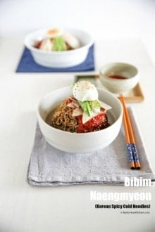 How to make classic Bibim Naengmyeon (Korean spicy cold noodles). They are spicy, sweet and tangy addictive noodle dish that is very popular in summer! | MyKoreanKitchen.com