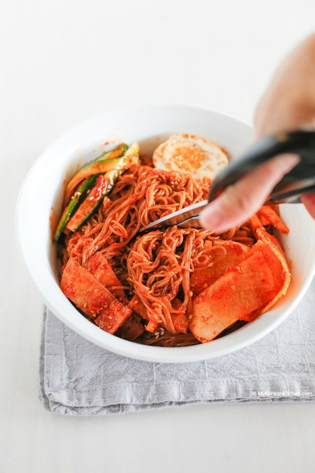How to eat Bibim Naengmyeon (Korean spicy cold noodles) | MyKoreanKitchen.com