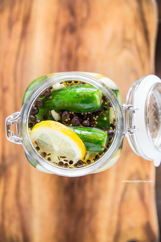 Pickled lemon and cucumbers in a jar