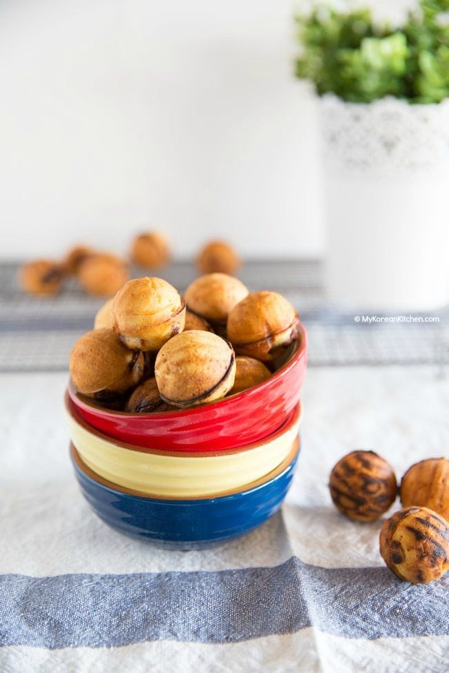 Korean walnut cakes in a stacked bowl