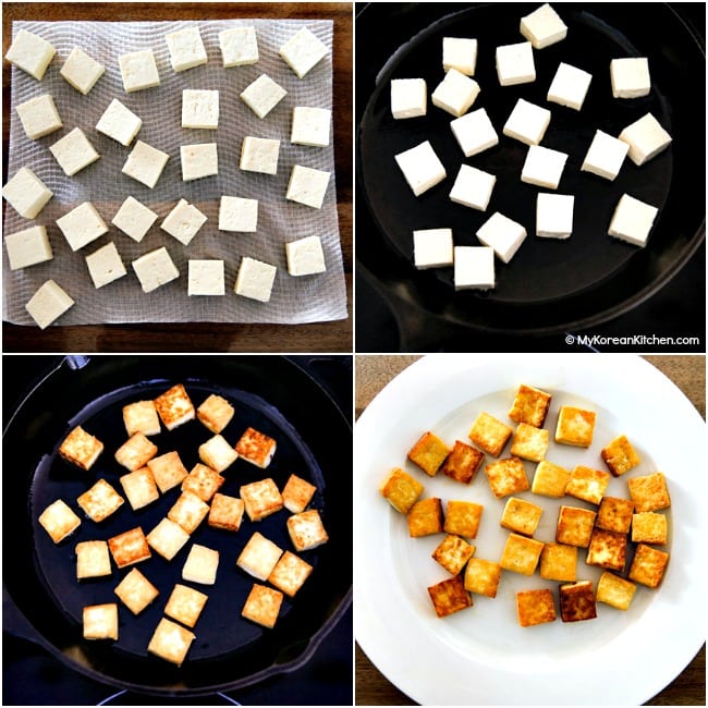 pan frying cubed tofu in a skillet