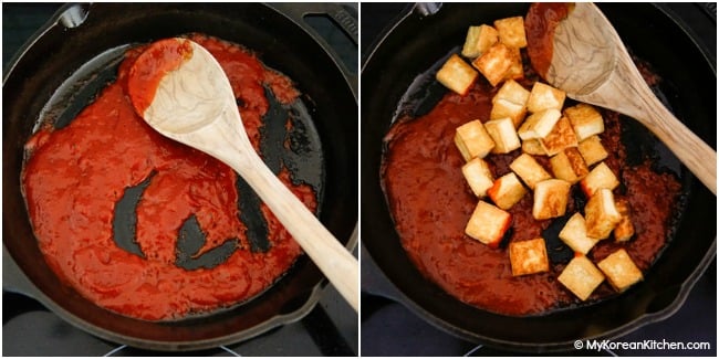Mixing pan fried tofu with spicy ketchup in a skillet