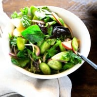 Korean green salad in a white bowl