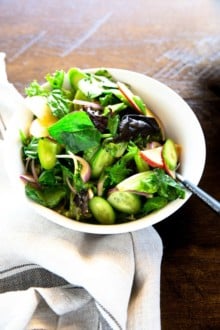 Korean green salad in a white bowl