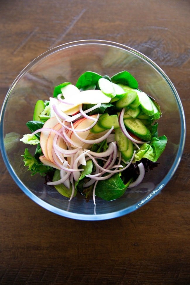 Korean green salad ingredients in a bowl