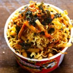 Nuclear fire noodles and french fries loaded in a noodle cup