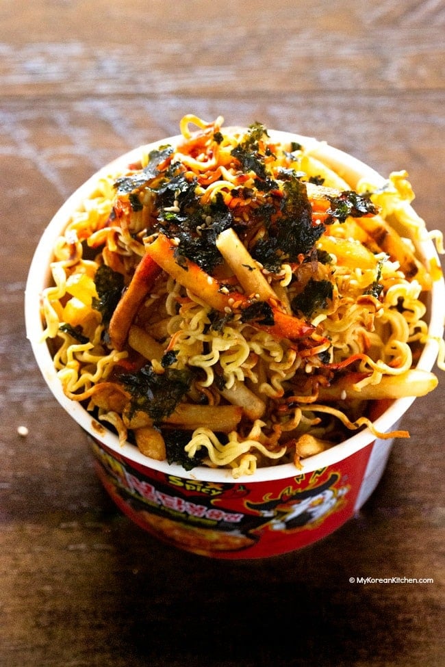 Nuclear fire noodles and french fries loaded in a noodle cup