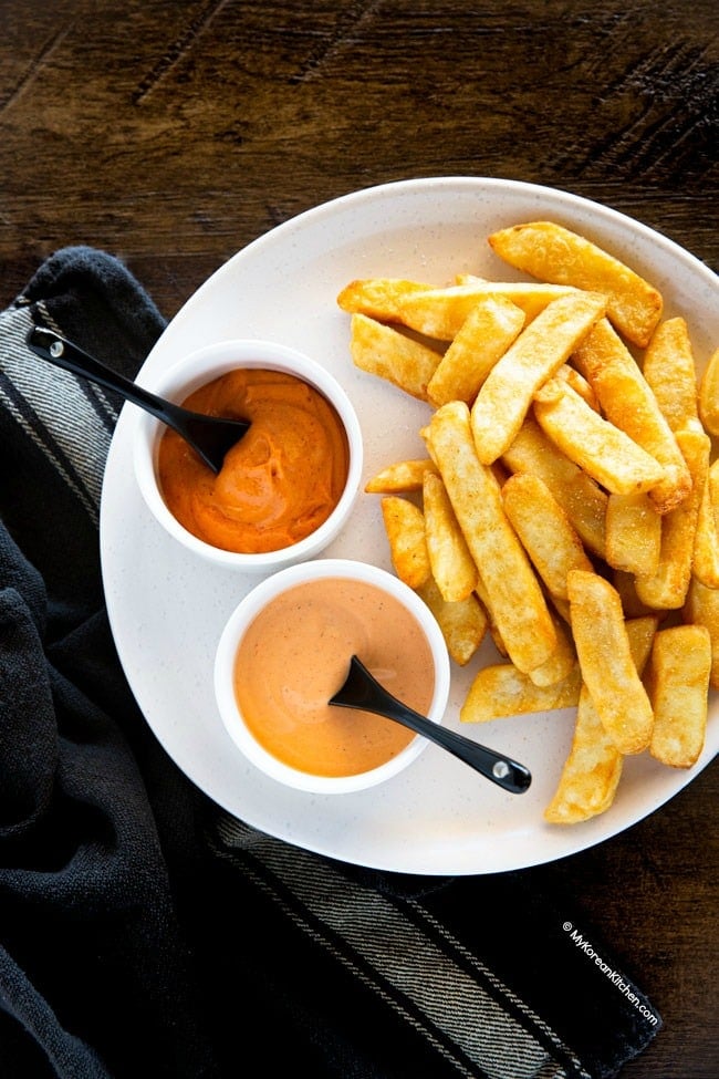 spicy gochujang mayo and spicy sriracha mayo served with fries