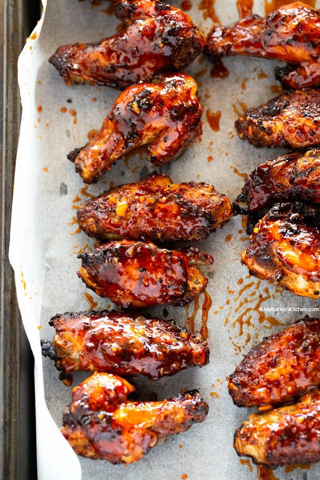 chicken wings coated with sticky sauce