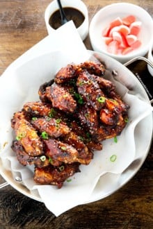 Korean chicken wings serve on paella pan
