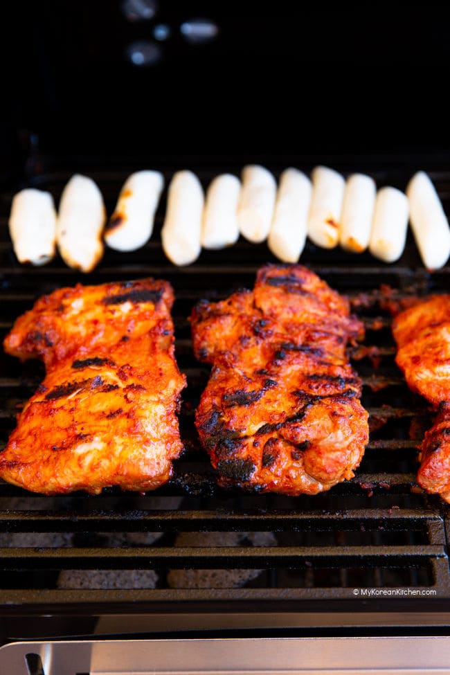 chargrilling chicken thighs and rice cakes