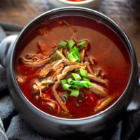 Yukgaejang served in a black earthen bowl