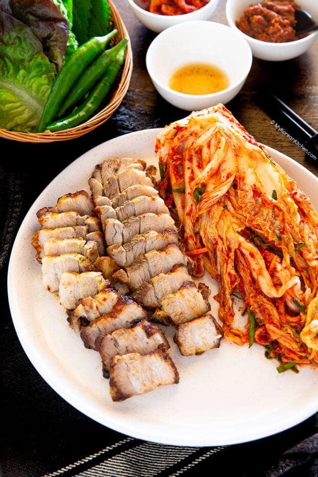 Bite sized air fried pork belly served with kimchi