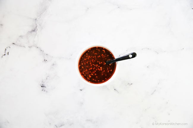 spicy noodle salad sauce in a small bowl