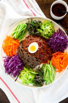 Noodles, vegetables and sauce on a large platter