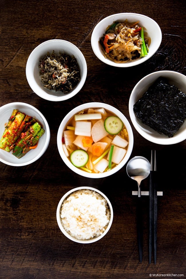 Nabak kimchi served alongside early korean slope dishes and a stadium of rice.
