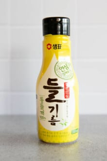 Korean perilla oil in a yellow bottle