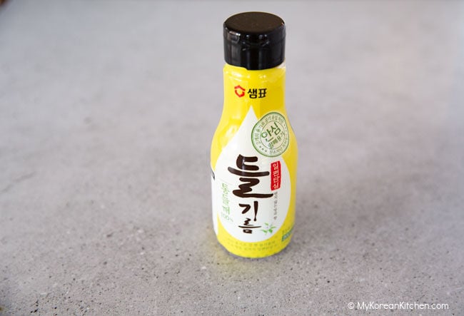 Korean perilla oil in a yellow bottle