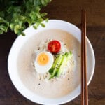 Kongguksu made with chickpeas served in a white bowl.