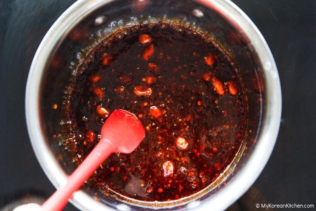 Making Korean-style mala sauce in a stainless steel saucepan.