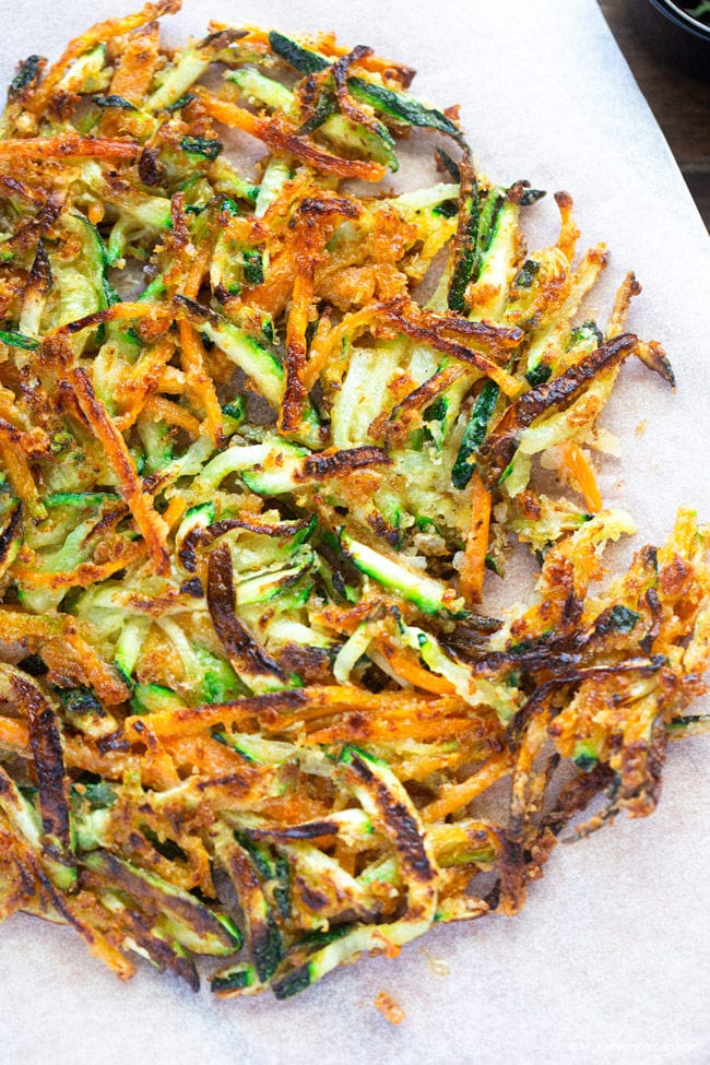 Close-up of a crispy Korean zucchini pancake on a baking sheet