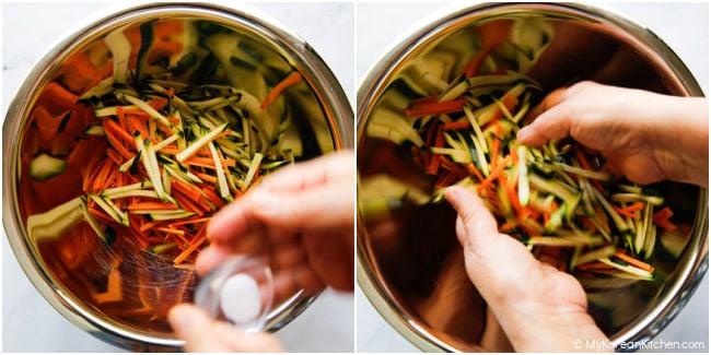 Adding salt to julienned zucchini and carrots to draw out moisture