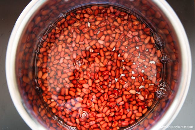 Red beans in a saucepan ready to be boiled.