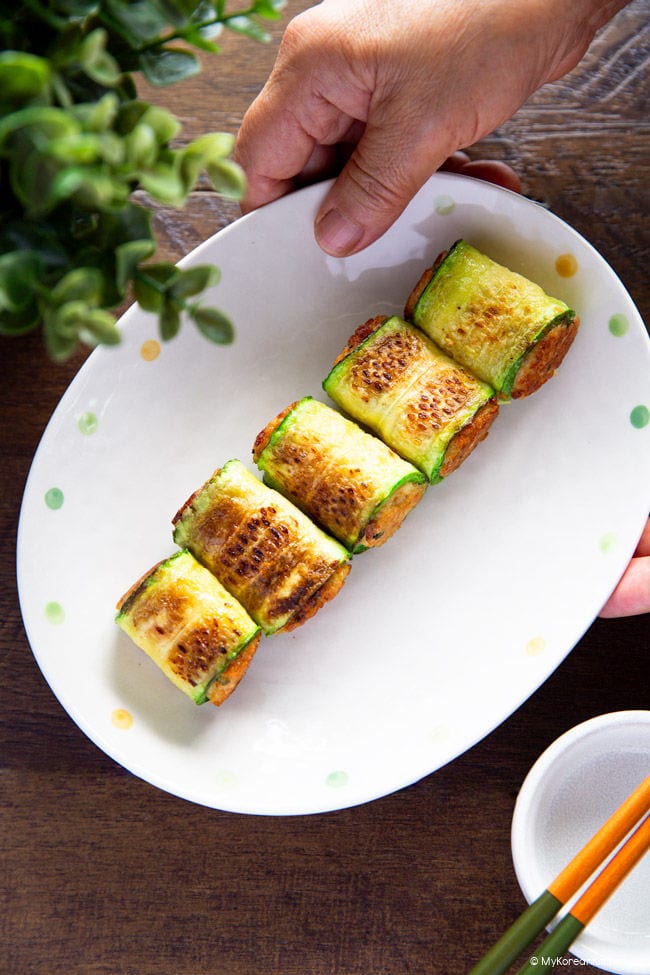 Korean zucchini rolls hobak mari served golden and pan fried