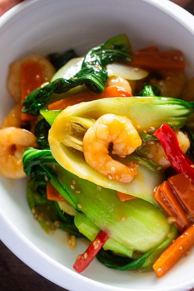 close-up of bok choy and shrimp in a bowl