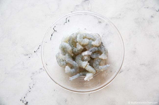shrimp marinating in a bowl