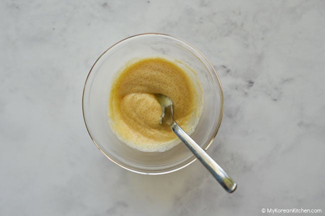 Mixing the creamy dressing for Korean pumpkin salad.